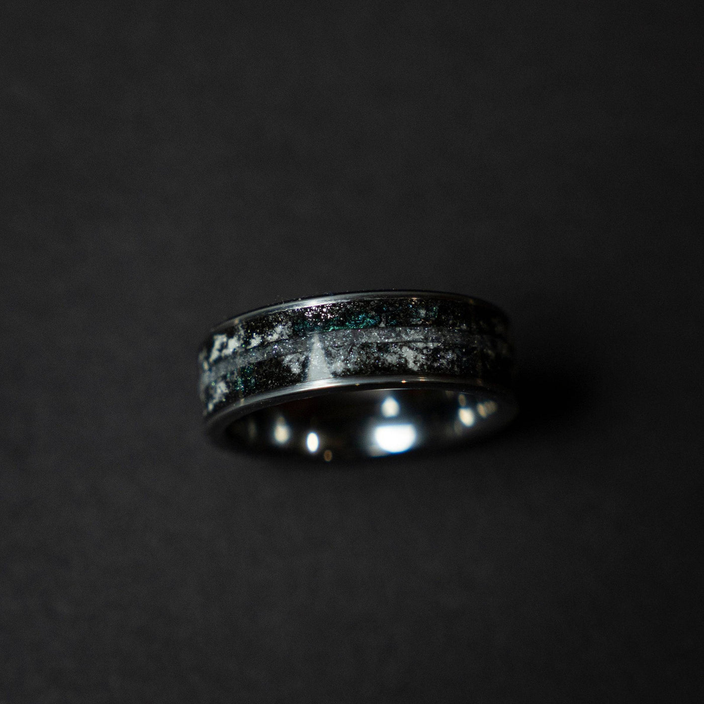 Tungsten ring with a line of Herkimer diamond, meteorite and glow