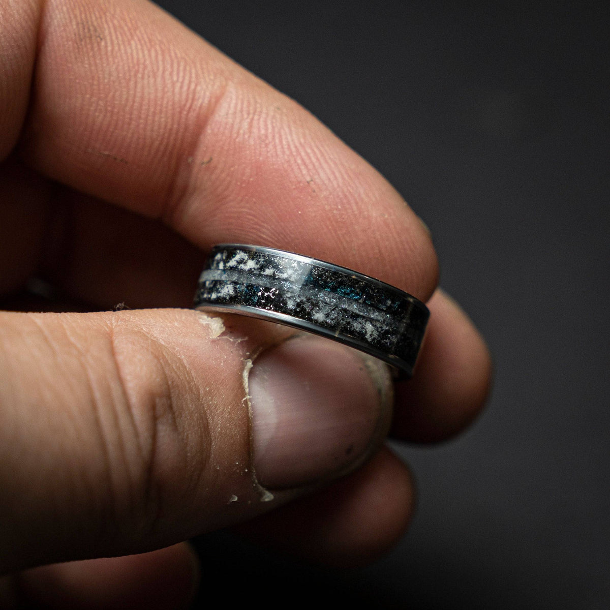 Tungsten ring with a line of Herkimer diamond, meteorite and glow