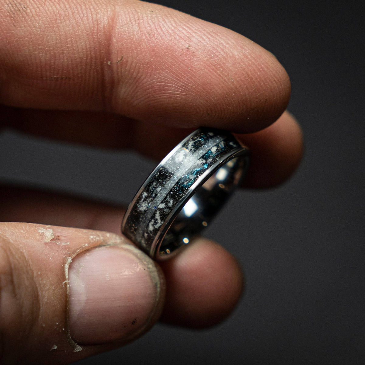 Tungsten ring with a line of Herkimer diamond, meteorite and glow