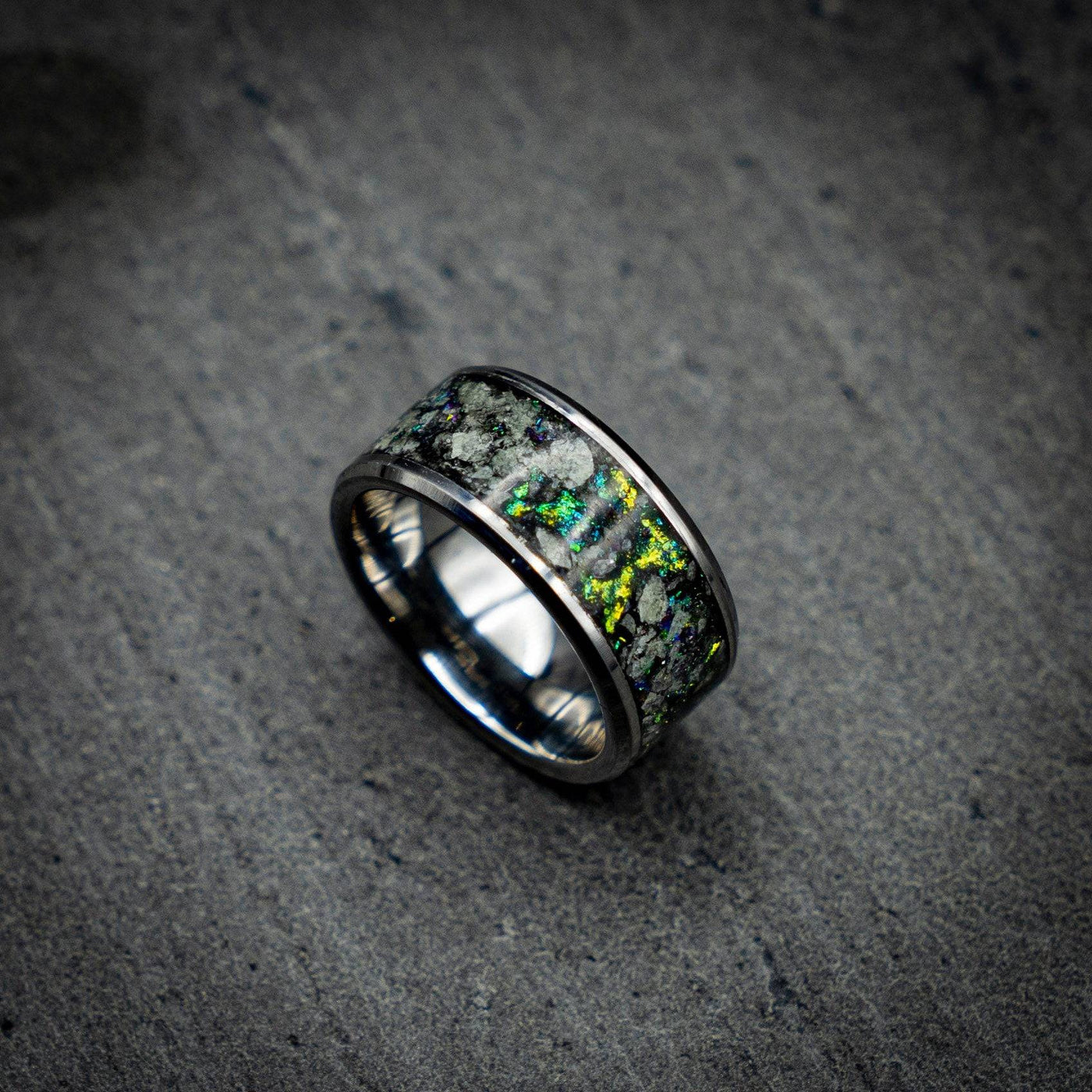 Tungsten ring with green chameleon flakes and green glow stones