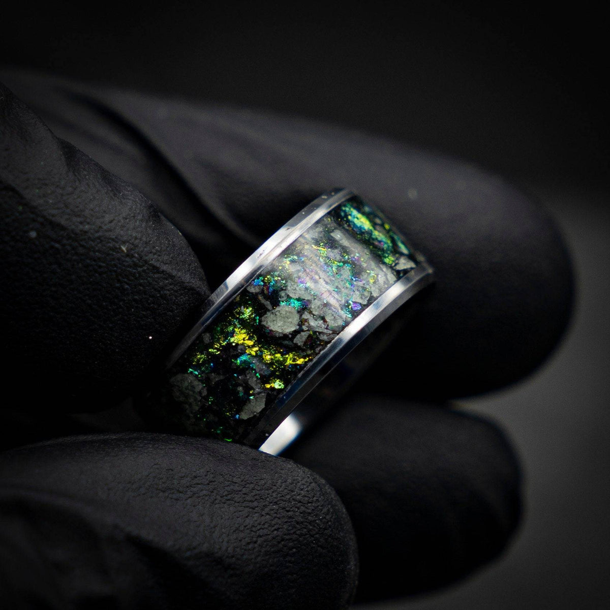 Tungsten ring with green chameleon flakes and green glow stones