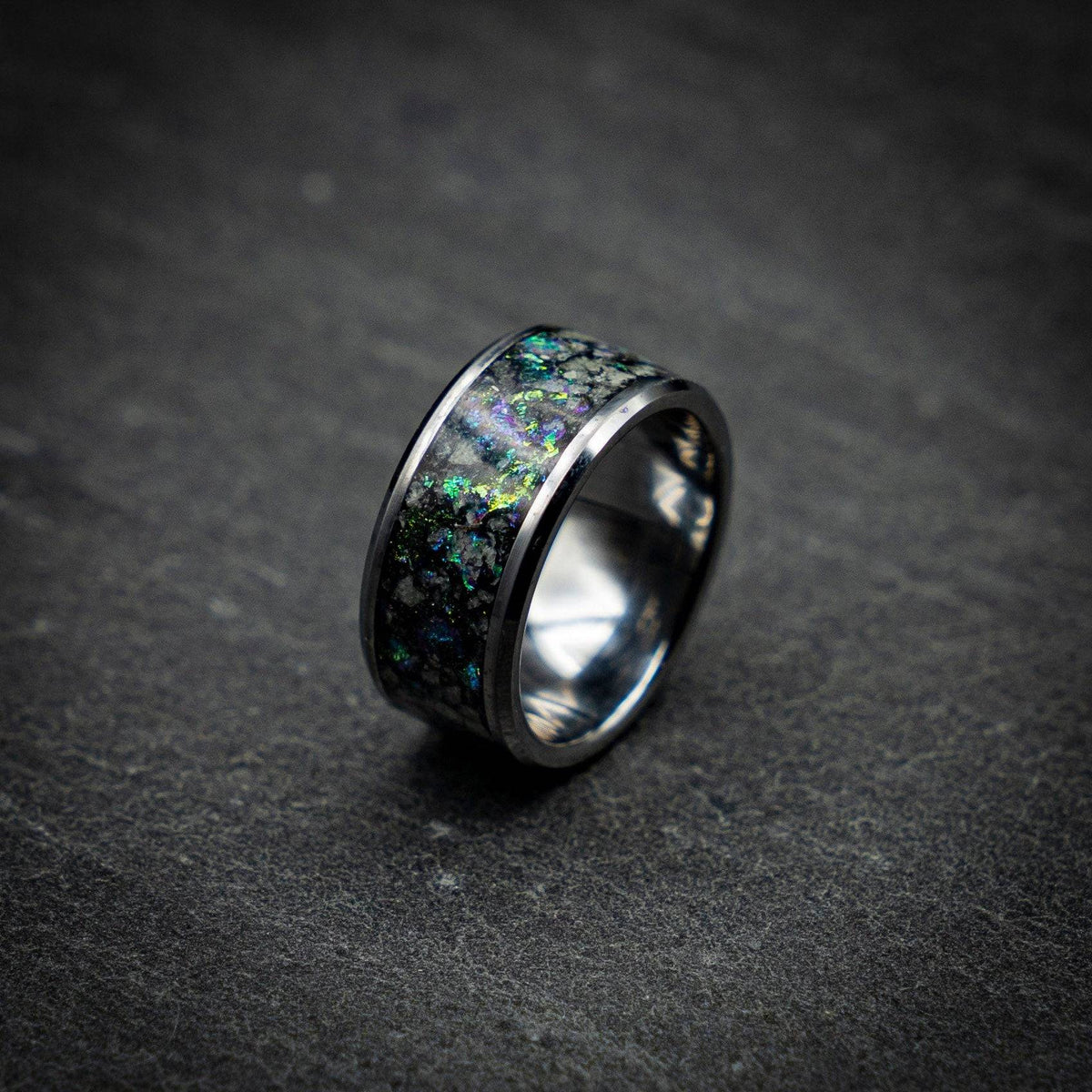 Tungsten ring with green chameleon flakes and green glow stones