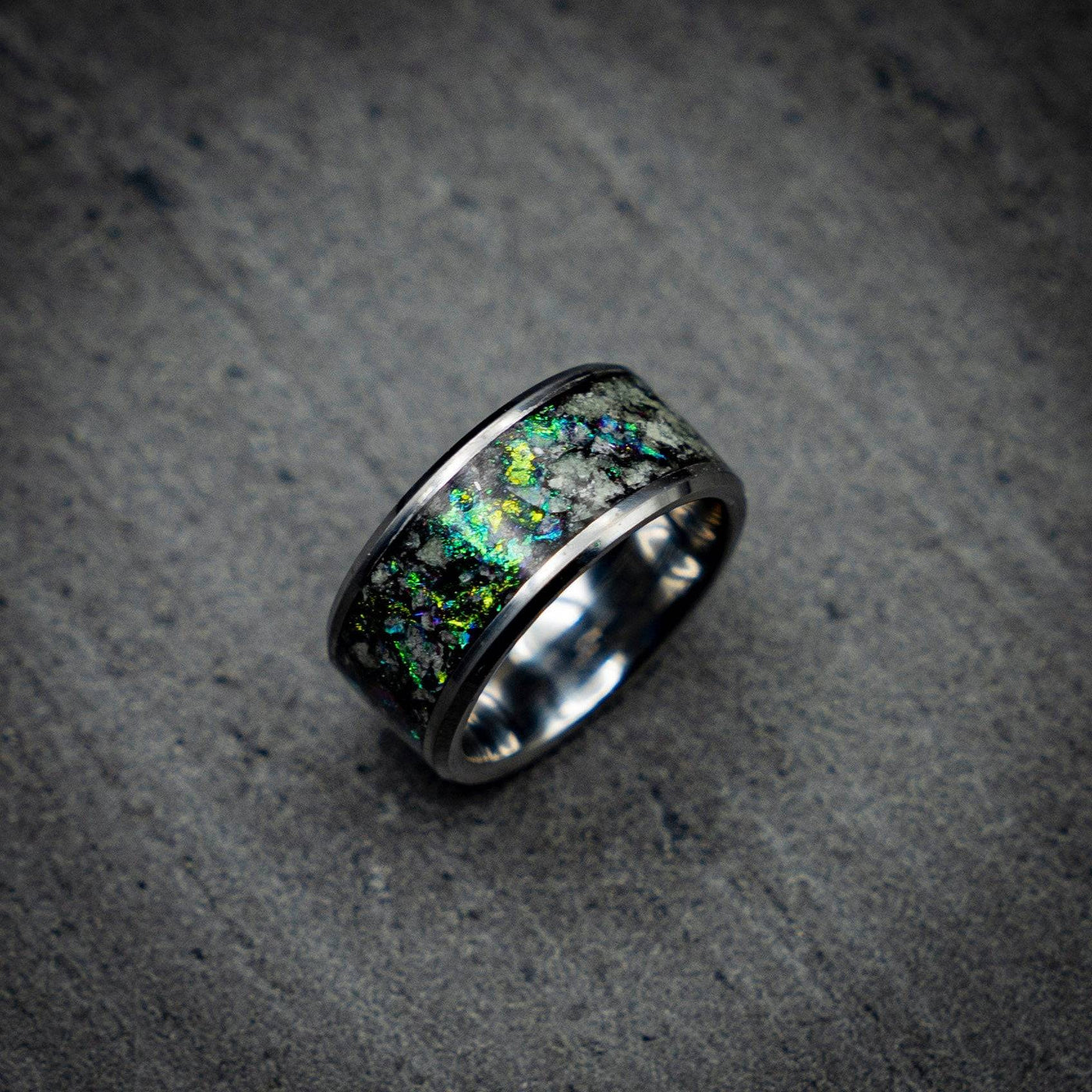 Tungsten ring with green chameleon flakes and green glow stones