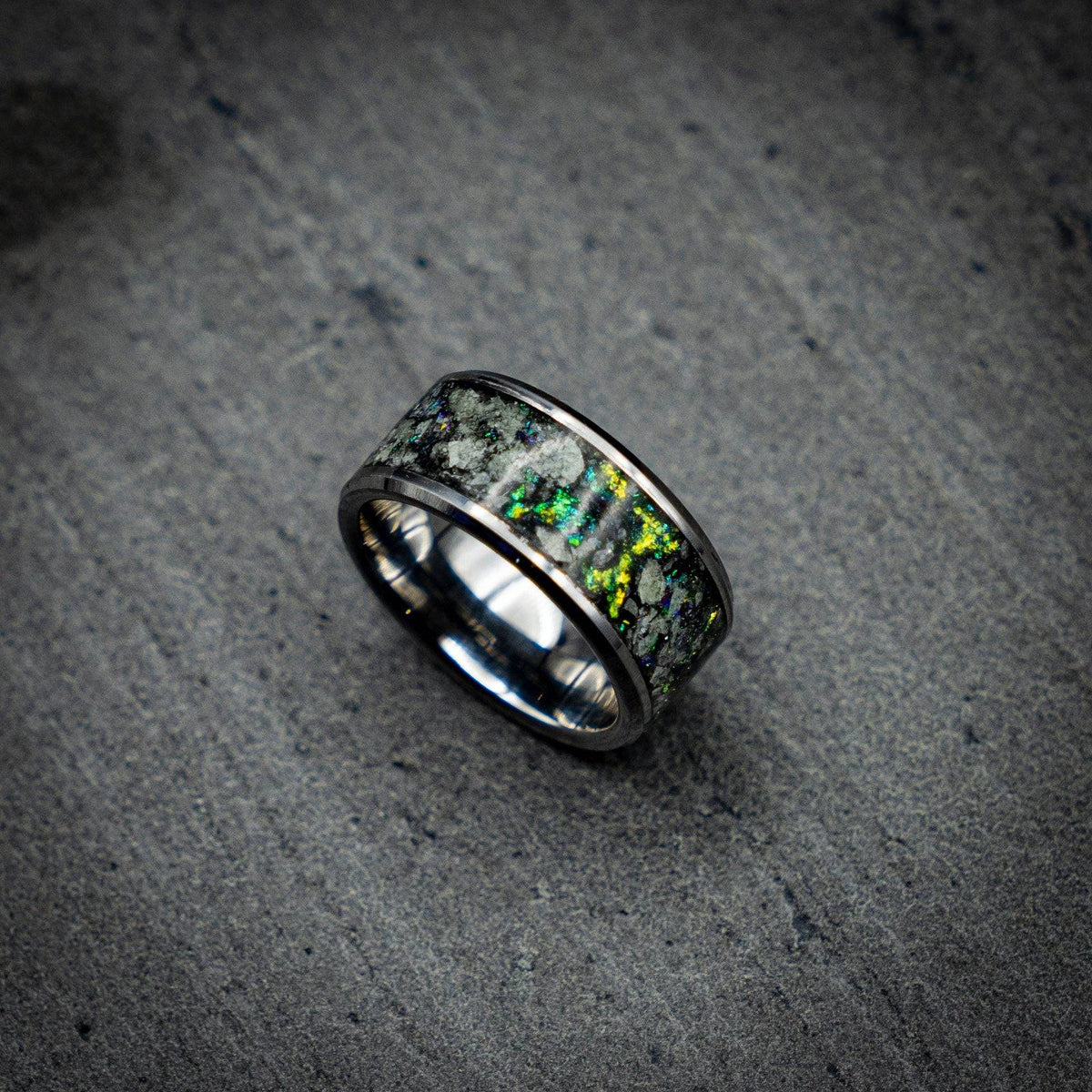 Tungsten ring with green chameleon flakes and green glow stones